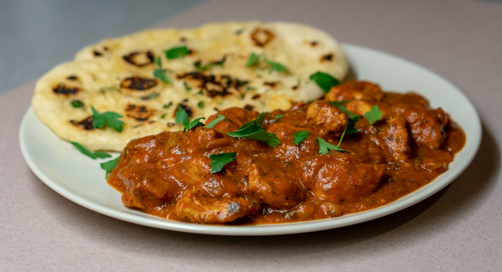 Indian curry with freshly baked naan